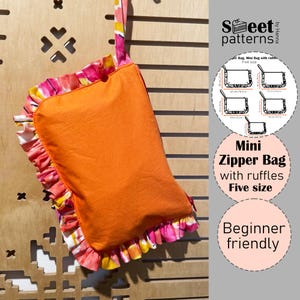 May include: A bright orange mini zipper bag with a ruffled edge and strap, adorned with a vibrant floral print. The bag's design is beginner-friendly. The image also includes size details in cm. The bag is a rectangular shape.