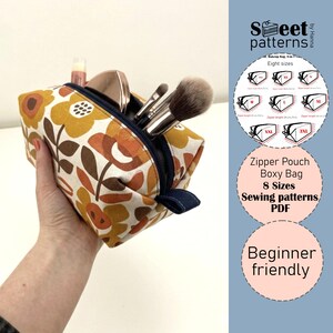 May include: A trio of ceramic mugs with a speckled, matte finish in cream, light grey, and dark grey. Each mug features a simple, minimalist design, ideal for tea or coffee.