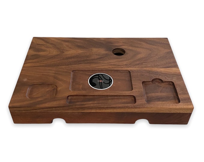 Wood monitor stand.  This desk organizer provides cable management and wireless charging.