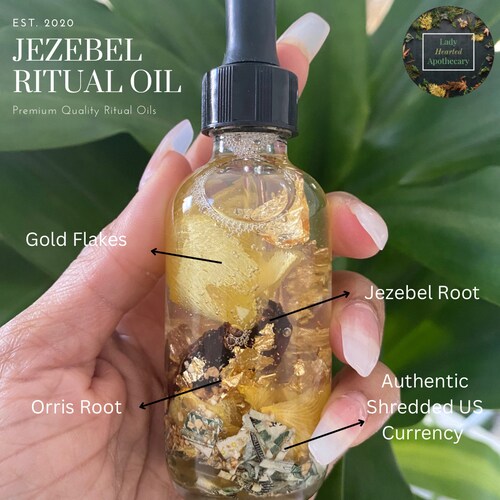 Jezebel Ritual Oil: Root, Ginger & Shredded Money Infusion