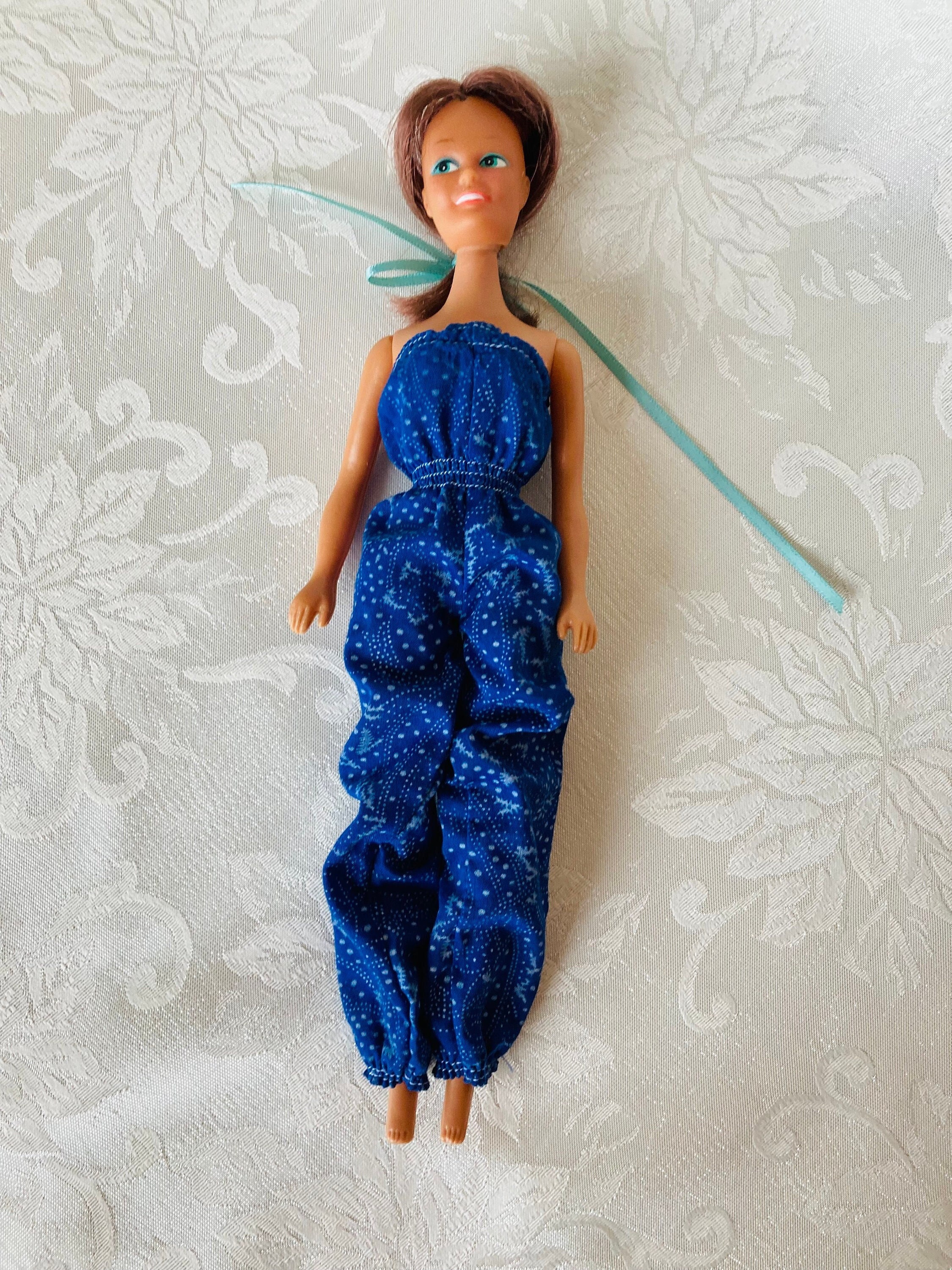 Barbie blue jumpsuit sales