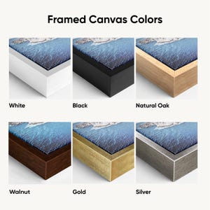May include: Image showcasing framed canvas art in six different frame colors: white, black, natural oak, walnut, gold, and silver. Each frame displays a landscape image with blue and white tones. The text "Framed Canvas Colors" is at the top.