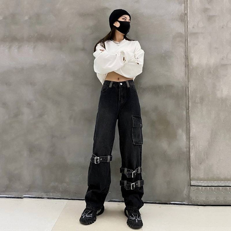 black baggy pants with white stitching