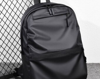 solid black backpack