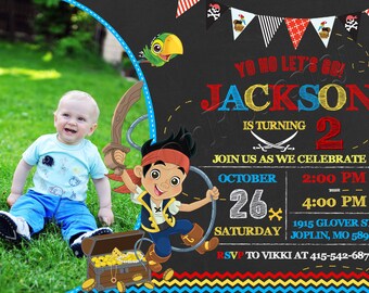 May include: A birthday invitation card featuring a black chalkboard background with colorful pirate-themed graphics, including a cartoon pirate character, a treasure chest, and bunting. The text reads: YO HO LET'S GO! JACKSON IS TURNING 2.