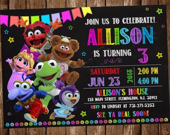 May include: A black chalkboard-style birthday party invitation featuring Muppet characters. The invitation reads "Join us to celebrate! Allison is turning 3" with event details. Colorful stars and a rainbow border decorate the invitation.