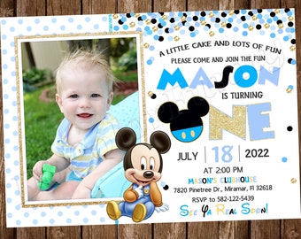 May include: A blue and gold birthday invitation with a photo of a baby boy. The invitation features a Mickey Mouse character and the text "MASON IS TURNING ONE". The invitation also includes the date, time, and location of the party.