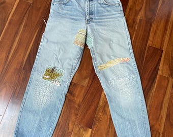 vintage återanvända Levi-jeans med röda flik