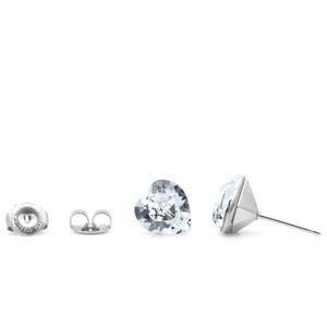 May include: A pair of silver heart-shaped stud earrings with clear crystal accents. The earrings are shown from different angles, including the back of the earring.