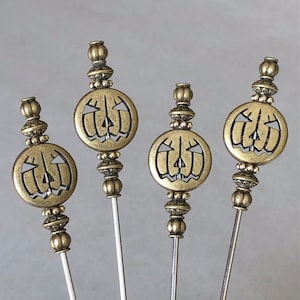 cocktail picks - food picks - jack-o-lantern pumpkins - antiqued gold toned metal - food grade stainless steel - set of 4