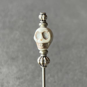 swizzle stick - drink stirrer - barware - reconstituted stone skull with antiqued silver plated accents - food grade stainless steel