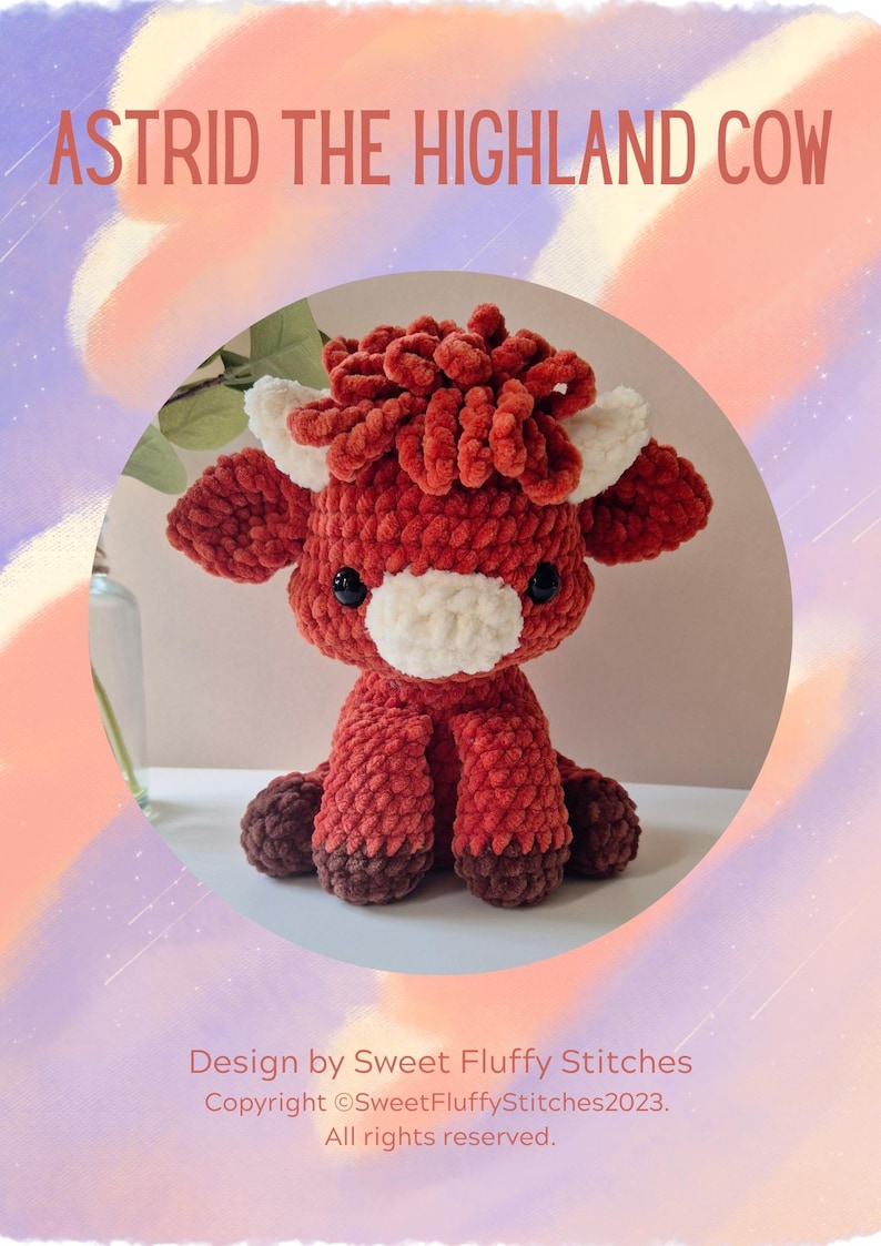 May include: A red and white crocheted Highland cow plush toy with a fluffy brown mane. The toy is sitting on a white surface. Astrid the Highland Cow.