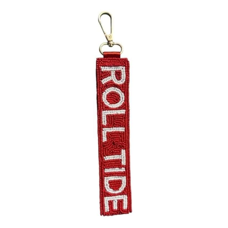 May include: Red beaded keychain with a gold clasp and the words "Roll Tide" in white beads.