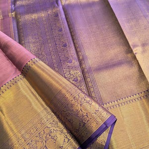 Styled pleats view of mauve kanjivaram silk saree