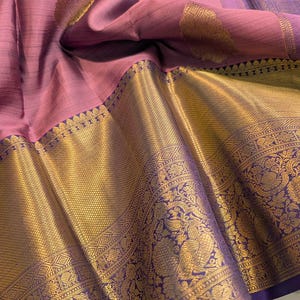 Close up of kanjivaram silk fabric with 2 gram gold zari detail