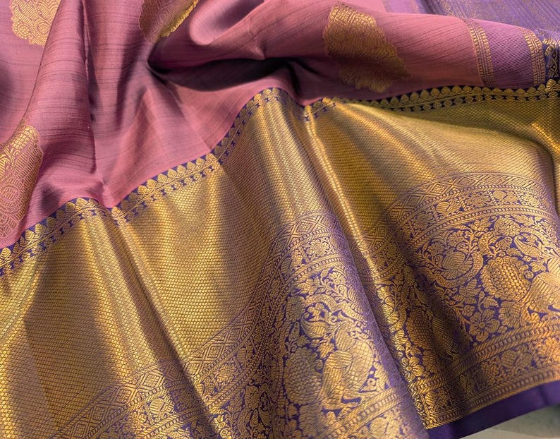 Close up of kanjivaram silk fabric with 2 gram gold zari detail