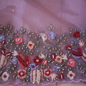 Border detail of lilac organza silk saree with embroidery
