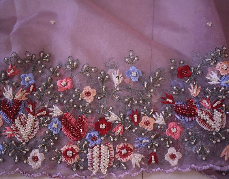 Border detail of lilac organza silk saree with embroidery