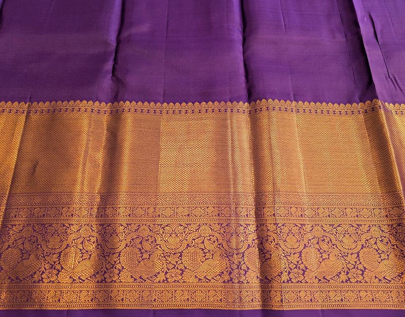 Blouse piece view of matching mauve kanjivaram blouse fabric