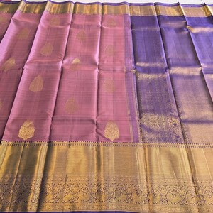 Full open view of mauve pure kanjivaram silk saree with gold zari