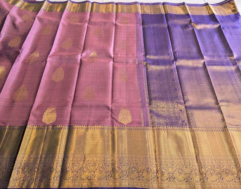 Full open view of mauve pure kanjivaram silk saree with gold zari