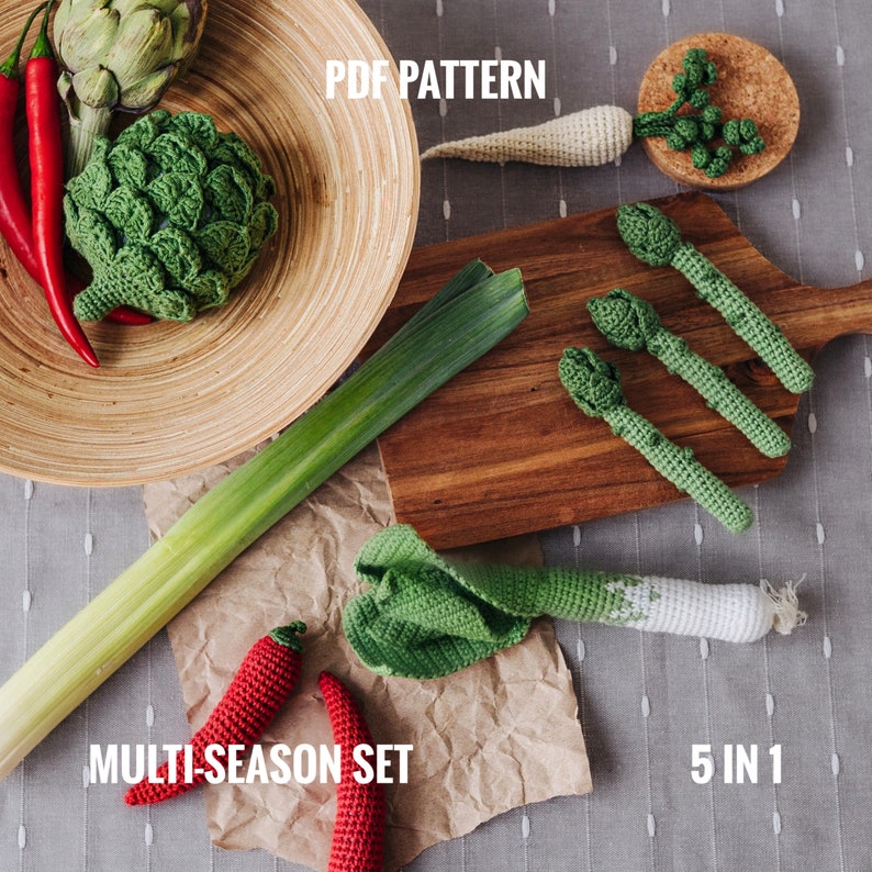 May include: A set of five crocheted vegetables, including an artichoke, asparagus, leeks, and chili peppers. The vegetables are arranged on a wooden cutting board and a brown paper bag. The text "PDF PATTERN" and "MULTI-SEASON SET 5 IN 1" is visible in the image.