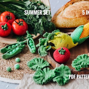 May include: A crochet summer set of vegetables, including a corn on the cob, tomato, lettuce, and peas. The set is displayed on a wooden tray with a wooden spoon. The text "SUMMER SET" and "5 IN 1" are visible in the image. The text "PDF PATTERN" is also visible in the image.