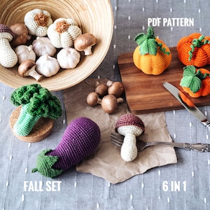 May include: Crochet amigurumi fall harvest set with 6 different vegetables and pumpkins. The set includes a purple eggplant, green broccoli, brown mushroom, white mushroom, orange pumpkin, and green pumpkin. The crochet patterns are available for download as a PDF.
