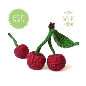 May include: Crochet pattern for a cherry with a green stem and leaf. The pattern is easy to follow and includes instructions for making the cherry and the stem. The pattern is available as a PDF download.