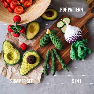 May include: A set of five crochet amigurumi patterns for a summer fruit and vegetable theme. The patterns include a tomato, avocado, cucumber, turnip, and green beans. The patterns are available as a PDF download. "PDF Pattern" and "Summer Set" are written on the image. "5 in 1" is also written on the image.