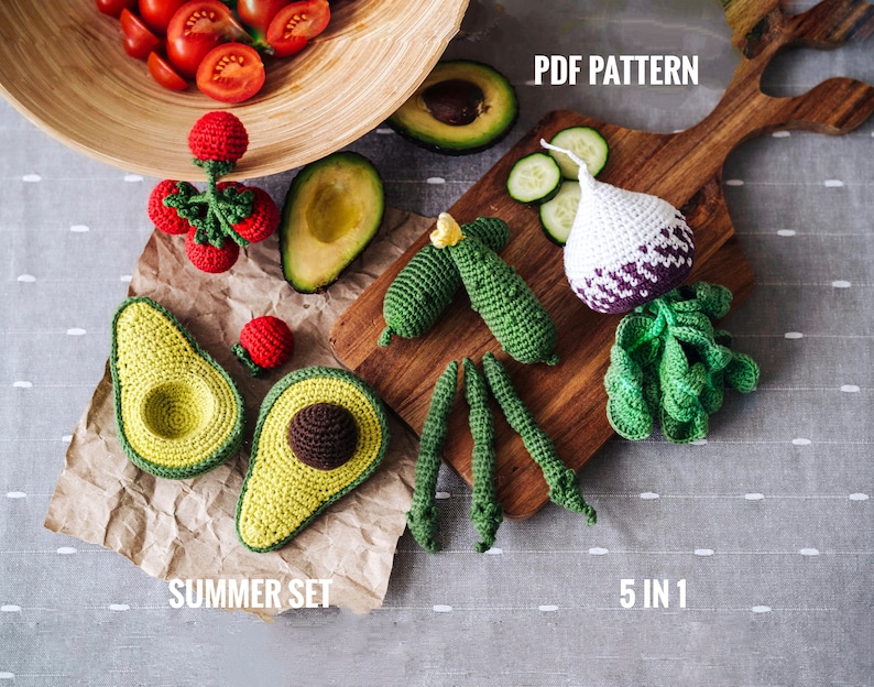 May include: A set of five crochet amigurumi patterns for a summer fruit and vegetable theme. The patterns include a tomato, avocado, cucumber, turnip, and green beans. The patterns are available as a PDF download. "PDF Pattern" and "Summer Set" are written on the image. "5 in 1" is also written on the image.