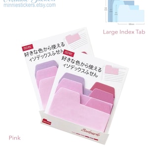 Puede incluir: Un paquete de 60 pesta&ntilde;as de &iacute;ndice rosas con el texto "好きな色から使える インデックスふせん" en japon&eacute;s. Las pesta&ntilde;as son de varios tonos de rosa y est&aacute;n dise&ntilde;adas para usarse como marcadores o separadores.