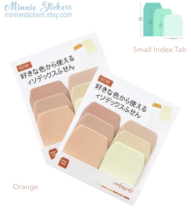 Puede incluir: Dos paquetes de 60 pesta&ntilde;as de &iacute;ndice redondeadas de color melocot&oacute;n, beige y amarillo claro. Las pesta&ntilde;as est&aacute;n etiquetadas con "60枚 好きな色から使える インデックスふせん", que se traduce como "60 piezas, puedes usar tu color favorito, pesta&ntilde;as de &iacute;ndice". Los paquetes est&aacute;n etiquetados con "Orange" y "ookmarks".