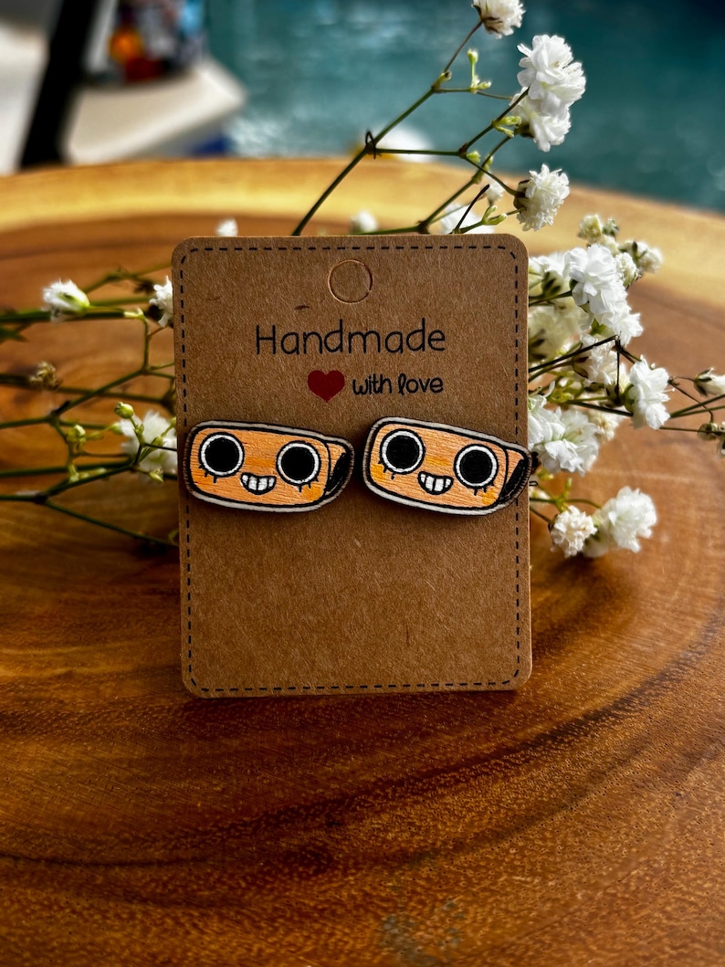 Shelly Dandys world Hand painted stud earrings! border