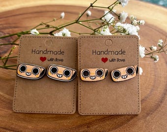 ¡Pendientes de botón pintados a mano del mundo de Shelly Dandy!