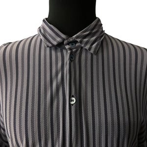 Men's jersey shirt by Armani collezioni | Button-up front in blue and grey stripes | Size XL fits small