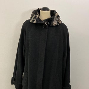 Women&#39;s, virgin wool coat by Mura | Vintage black swing coat with faux fur collar | Size EU 42
