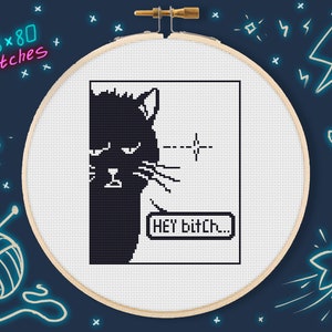 May include: Black and white cross-stitch pattern of a cat with the text "HEY bItCh..." in a speech bubble. The pattern is 98 stitches wide by 80 stitches high.