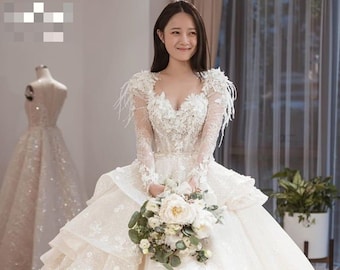 Unique crystal sparkling flowers lace princess wedding dress made to order | long sleeve ball gown with feather, glitters and beading