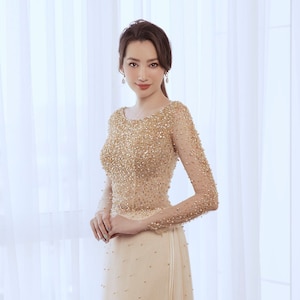 Gorgeous gold crystal beaded modern custom tailored wedding ao dai, traditional Vietnamese raglan dress for bride made to order