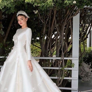 Miranda kerr's new arrivals wedding dress