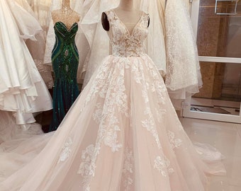 blush and lace wedding dress