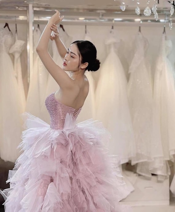 Blush pink top princess wedding dress