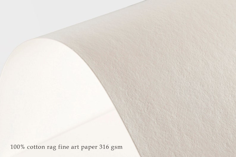 May include: Close-up of a textured, off-white fine art paper. The paper is 100% cotton rag and weighs 316 gsm.