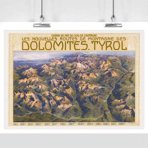 May include: A framed vintage travel poster featuring a detailed map of the Dolomites in Tyrol. The poster has a cream-colored border with text at the top that reads "LES NOUVELLES ROUTES DE MONTAGNE DES DOLOMITES. TYROL". The map shows the mountain range in shades of green, brown, and yellow.