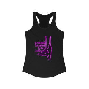 May include: Black tank top with a pink graphic of a person doing aerial silks. The graphic has the text "graceful bruised & loving it".