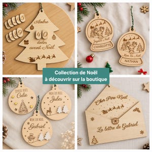 May include: A collection of laser-engraved wooden Christmas ornaments and decor, including a tree-shaped countdown calendar, snow globe-style baubles with reindeer, round ornaments with festive motifs, and a wooden envelope labeled La lettre de Gabriel.