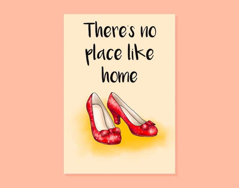May include: A card with the text "There's no place like home" and a pair of red sparkly shoes.