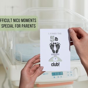 May include: A white card with the text "I joined the 5 lb club!" is held in front of a neonatal incubator. The card features a scale graphic with baby footprints. The text "MAKE DIFFICULT NICU MOMENTS BECOME SPECIAL FOR PARENTS" is also visible.