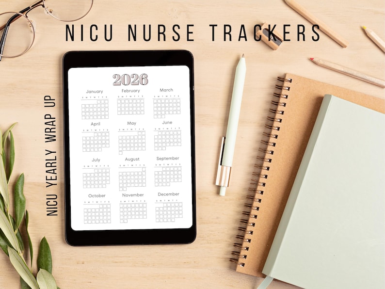 May include: A digital tablet displays a 2026 calendar for NICU nurse tracking, with months arranged in a grid. The image includes a pen, notebooks, and pencils, suggesting a planning or organizational theme. Text reads "NICU YEARLY WRAP UP" and "NICU NURSE TRACKERS".